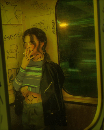 girl smoking on a train